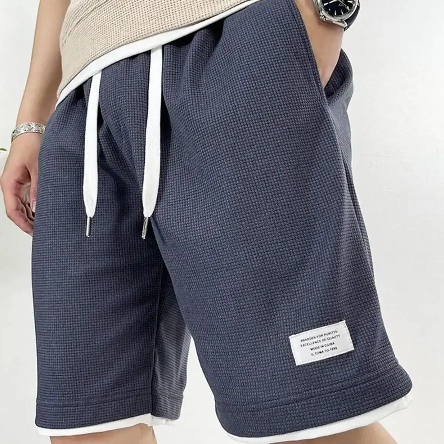 กางเกงขาสั้นผู้ชายสีดำลายวาฟเฟ - Summer Clothing Deals บทวิจารณ์และราคา